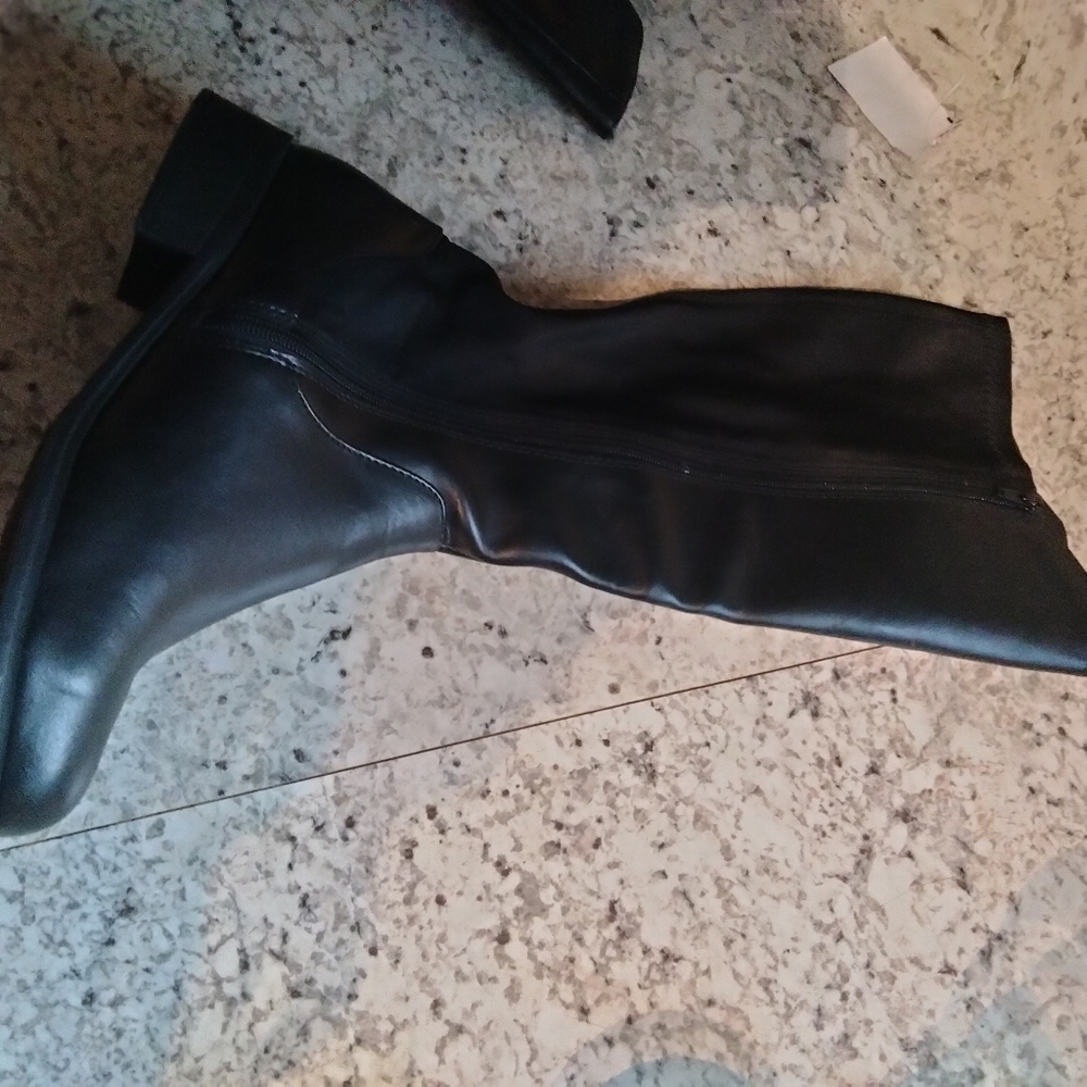 Tall black boots